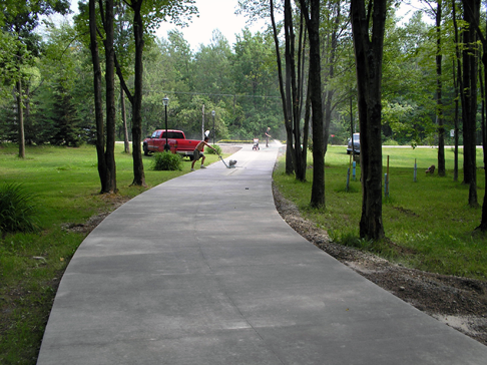 Akerly Concrete Construction has designed many driveways like this landscape-friendly, winding driveway, for Erie, PA area residences.