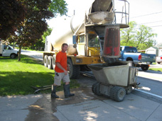 Akerly Concrete Construction crew uses various equipment to properly distribute your concrete with minimal disruption to surrounding areas.