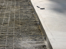 Rebar reinforced concrete floor preparation for commercial business in Erie, PA.